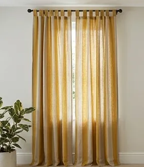 Full-length mustard-yellow sheer tab-top curtains
